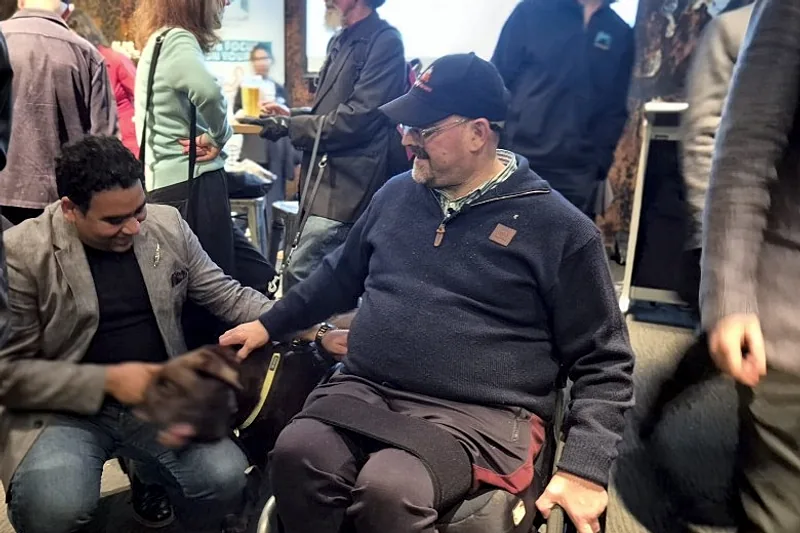 Ability Heroes community event — inclusive support with service dog